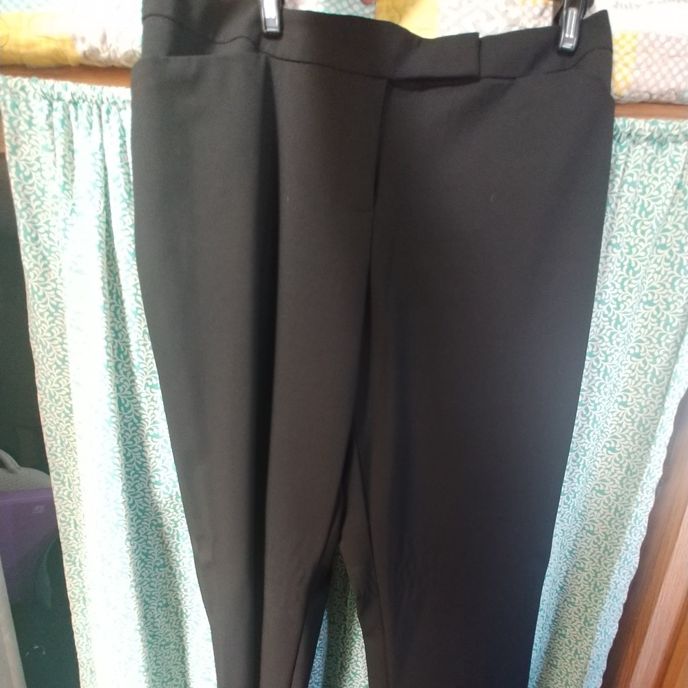 Black dress slacks. Thin breathable material.